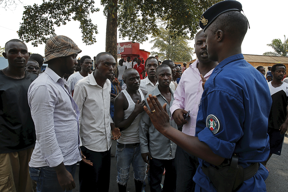 Protestors argue with police